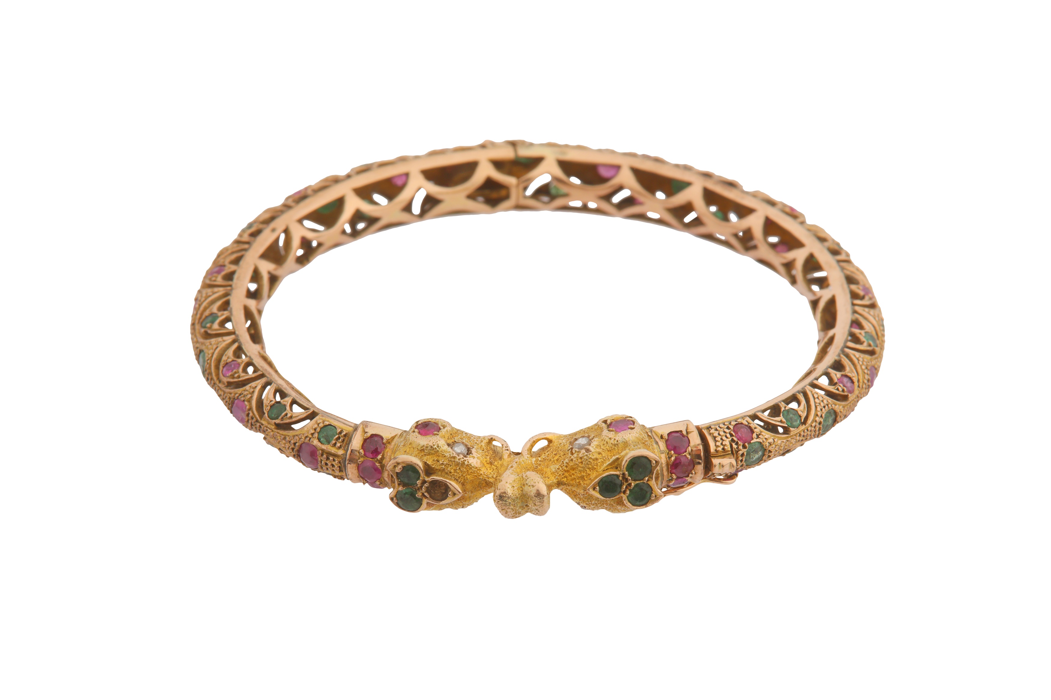 A RUBY AND EMERALD BANGLE