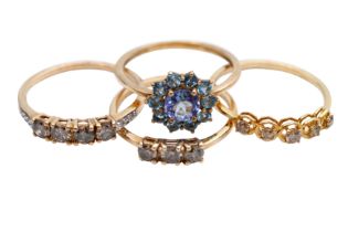 A GROUP OF FOUR 9CT GOLD GEM-SET RINGS