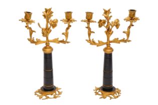 A PAIR OF ROCOCO-STYLE TWO-ARM CANDELABRA