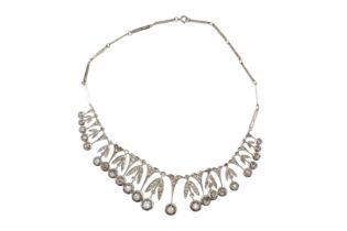 A STONE SET FRINGE NECKLACE