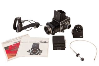 A Rolleiflex SL66 Medium Format SLR Camera With Accessories