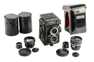 A Yashica 124G & Lens Attachments.