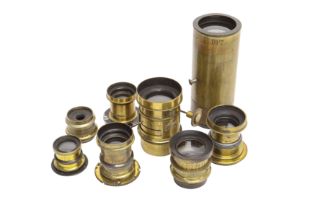 Eight Brass Alternative Process Lenses.