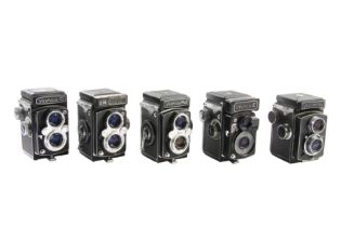 Five Yashica TLR Cameras.