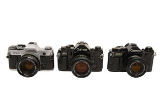 Three Canon A Series Cameras.