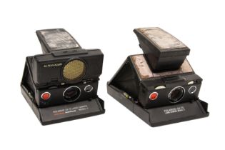 Two Polaroid SX-70 Cameras.