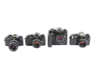 A Nikon FG & Other Nikon Cameras.