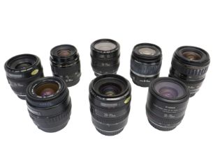 Eight Canon EF Zoom Lenses.