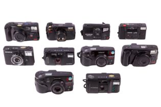 Ten Olympus Point and Shoot Cameras.
