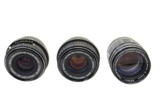 Three Pentax Lenses.