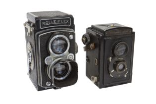 A Rolleiflex Model 1 and Voigtlander Brilliant.
