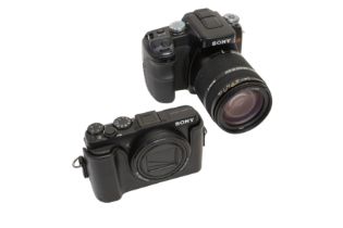 A Pair Of Sony Digital Cameras.