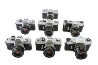 Eight Canon SLR Cameras.