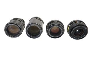 Four Pentax Lenses.