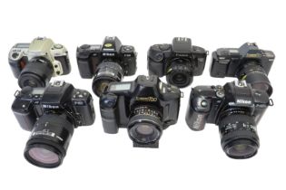 Seven Automatic SLR Film Cameras.