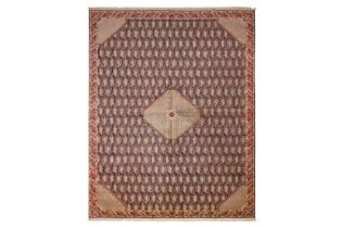 A VERY FINE SILK SIGNED CARPET WOVEN IN HEREKE STYLE