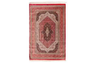 AN EXTREMELY FINE SIGNED SILK QUM RUG, CENTRAL PERSIA