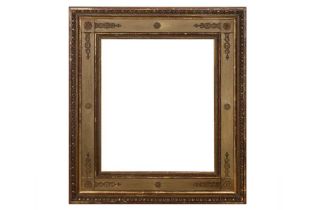 A 19TH CENTURY CASSETTA FRAME WITH APPLIED BRASS GARLANDS AND ROSETTES