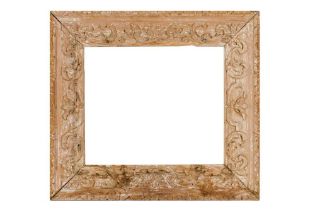 AN ITALIAN 18TH CENTURY CARVED AND STRIPPED FRAME