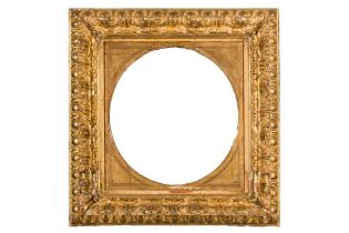 A BOLOGNESE 18TH CENTURY CARVED AND GILDED FRAME