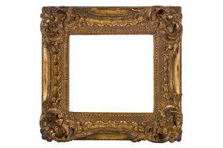 A PAIR OF LOUIS XV CARVED AND GILDED FRAMES