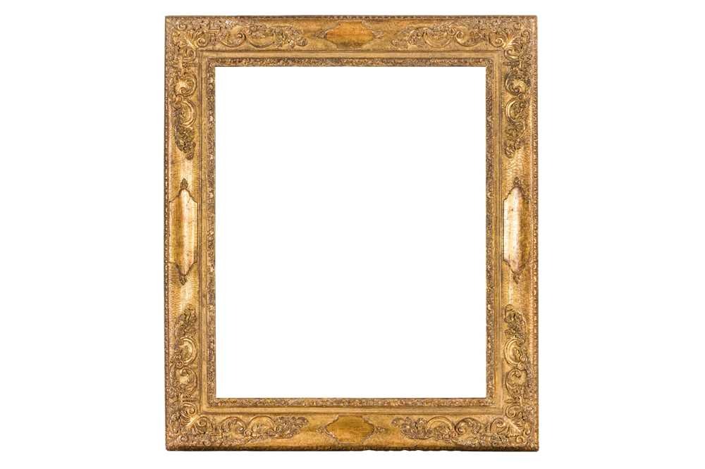 A VENETIAN 18TH CENTURY STYLE CARVED AND GILDED FRAME