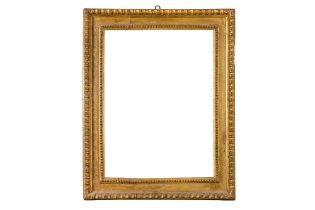 AN ITALIAN 18TH CENTURY CARVED AND GILDED FRAME