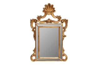 A BAROQUE STYLE FLORENTINE MIRROR WITH EASEL STAND, 20TH CENTURY