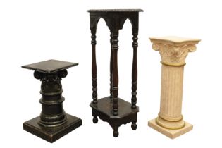 A GROUP OF THREE PEDESTAL AND TORCHERE STANDS