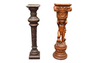 AN EARLY 20TH CENTURY CARVED OAK PEDESTAL COLUMN AND ONE OTHER