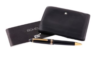A MONTBLANC MEISTERSTUCK PIX ROLLERBALL PEN TOGETHER WITH A TRIFOLD MONTBLANC WALLET