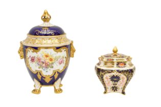 A ROYAL CROWN DERBY VASE AND COVER