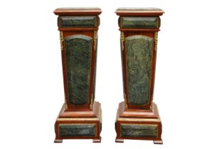 A PAIR OF LOUIS XVI STYLE WALNUT AND GREEN MARBLE PEDESTALS
