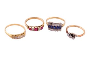 A GROUP OF FOUR GEM-SET RINGS