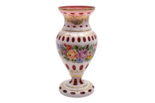 A LARGE BOHEMIAN RUBY GLASS VASE WITH WHITE OVERLAY, MID 20TH CENTURY