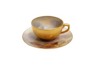 A HARRY STINTON ROYAL WORCESTER CABINET CUP AND SAUCER
