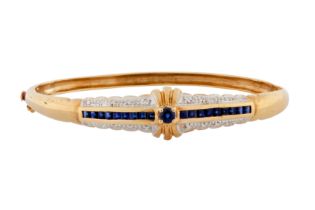 A SAPPHIRE AND DIAMOND BANGLE