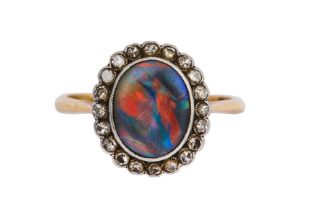 AN OPAL AND DIAMOND CLUSTER RING