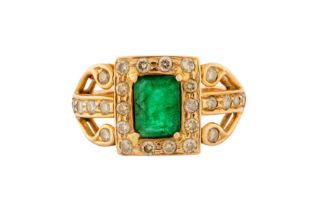 AN EMERALD AND DIAMOND RING