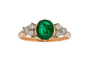 AN EMERALD AND DIAMOND RING