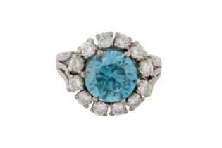 A BLUE ZIRCON AND DIAMOND CLUSTER RING