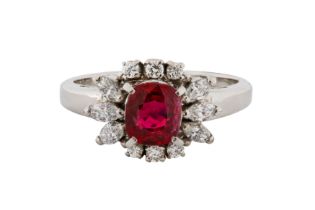 A RUBY AND DIAMOND CLUSTER RING