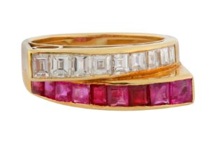 A RUBY AND DIAMOND CROSS-OVER RING