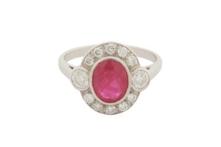 A RUBY AND DIAMOND CLUSTER RING