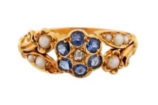 A SAPPHIRE AND SEED PEARL RING