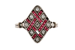 A DIAMOND AND RED STONE RING