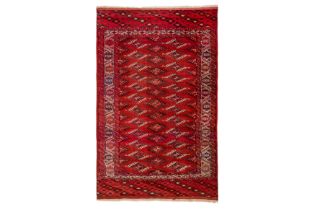 AN ANTIQUE YOMUT CARPET, TURKMENISTAN