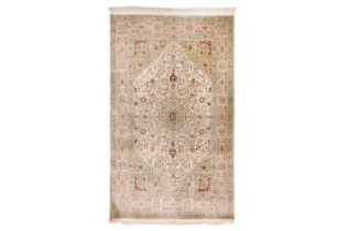 AN EXTREMELY FINE SILK INDIAN RUG