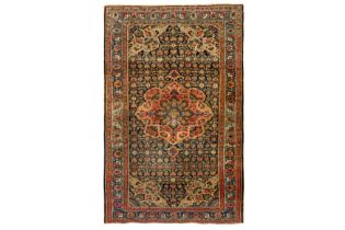 AN ANTIQUE BIJAR RUG, NORTH-WEST PERSIA