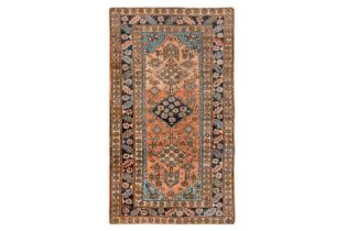 AN ANTIQUE HERIZ RUG, NORTH-WEST PERSIA